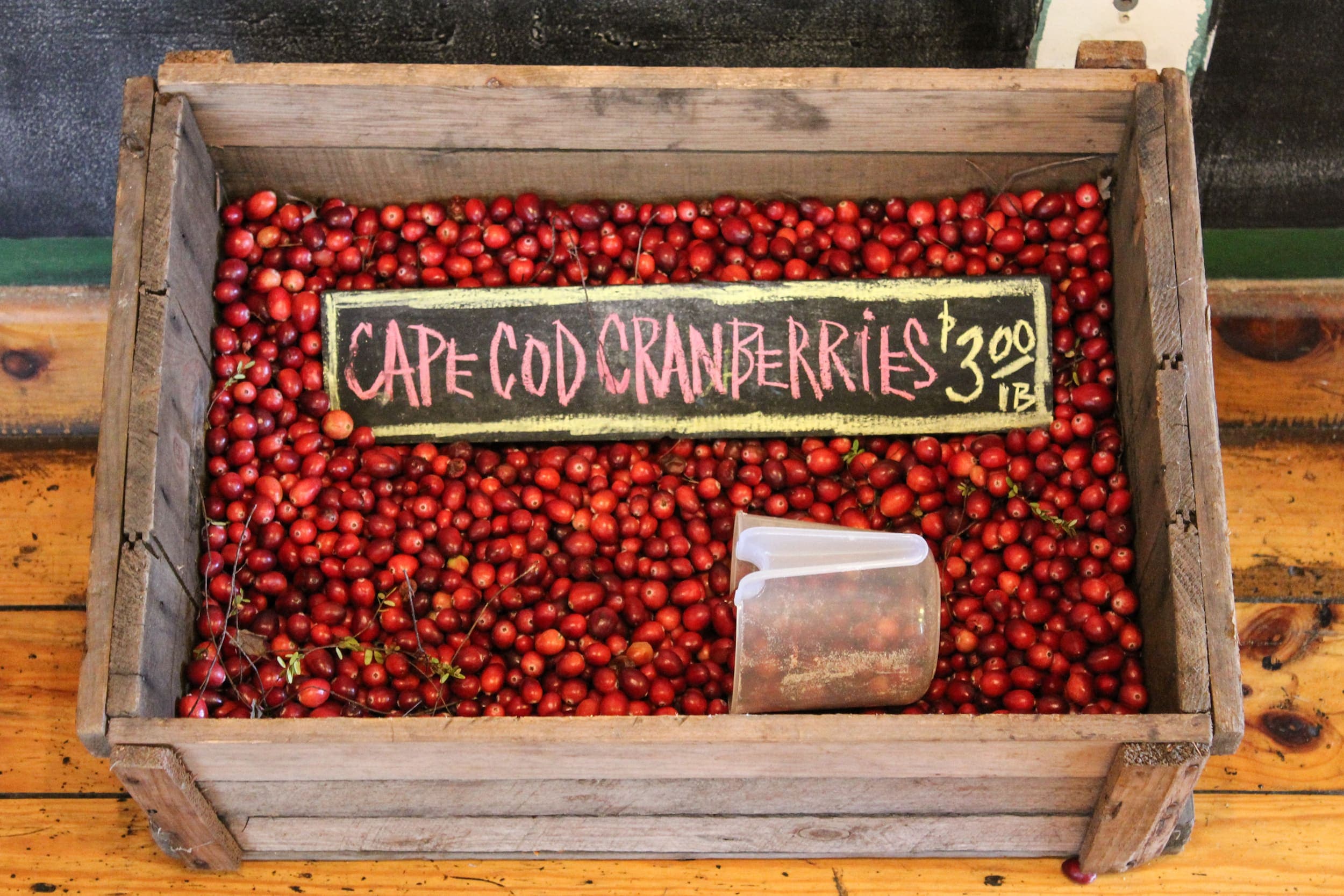A wooden box full of Cape Cod Cranberries