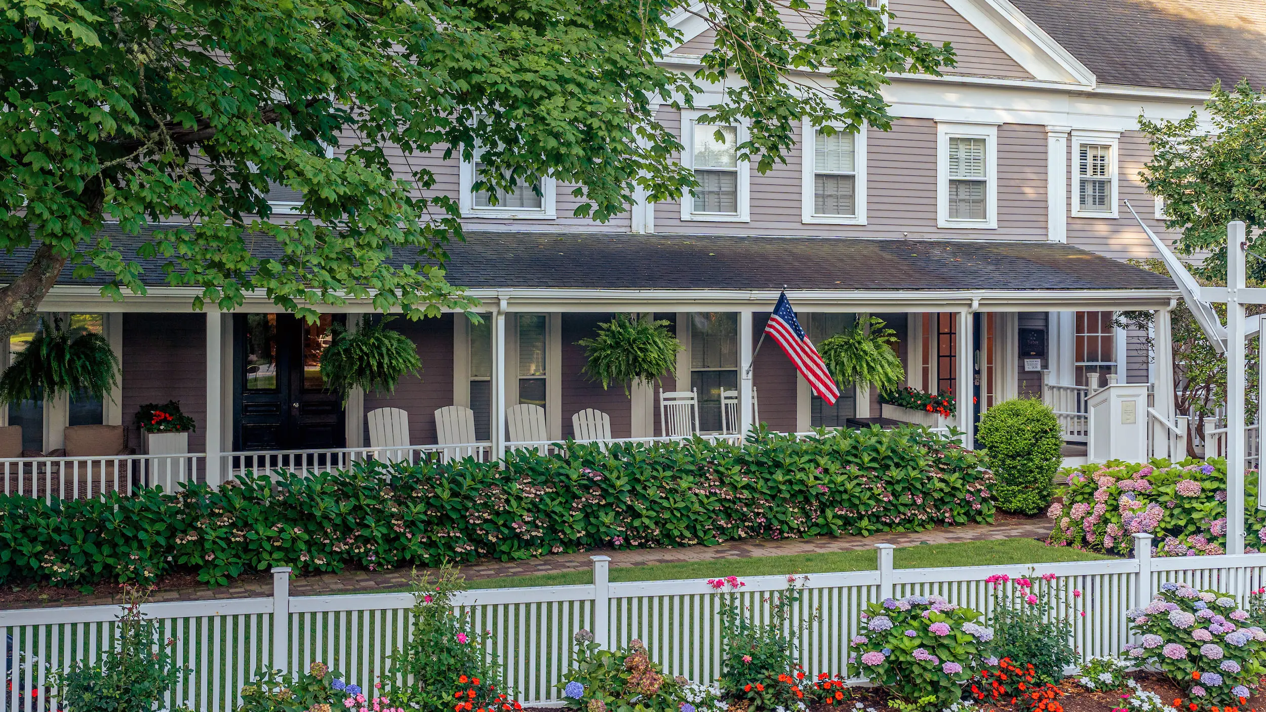 The exterior of the Chatham Inn with gorgeous flowers