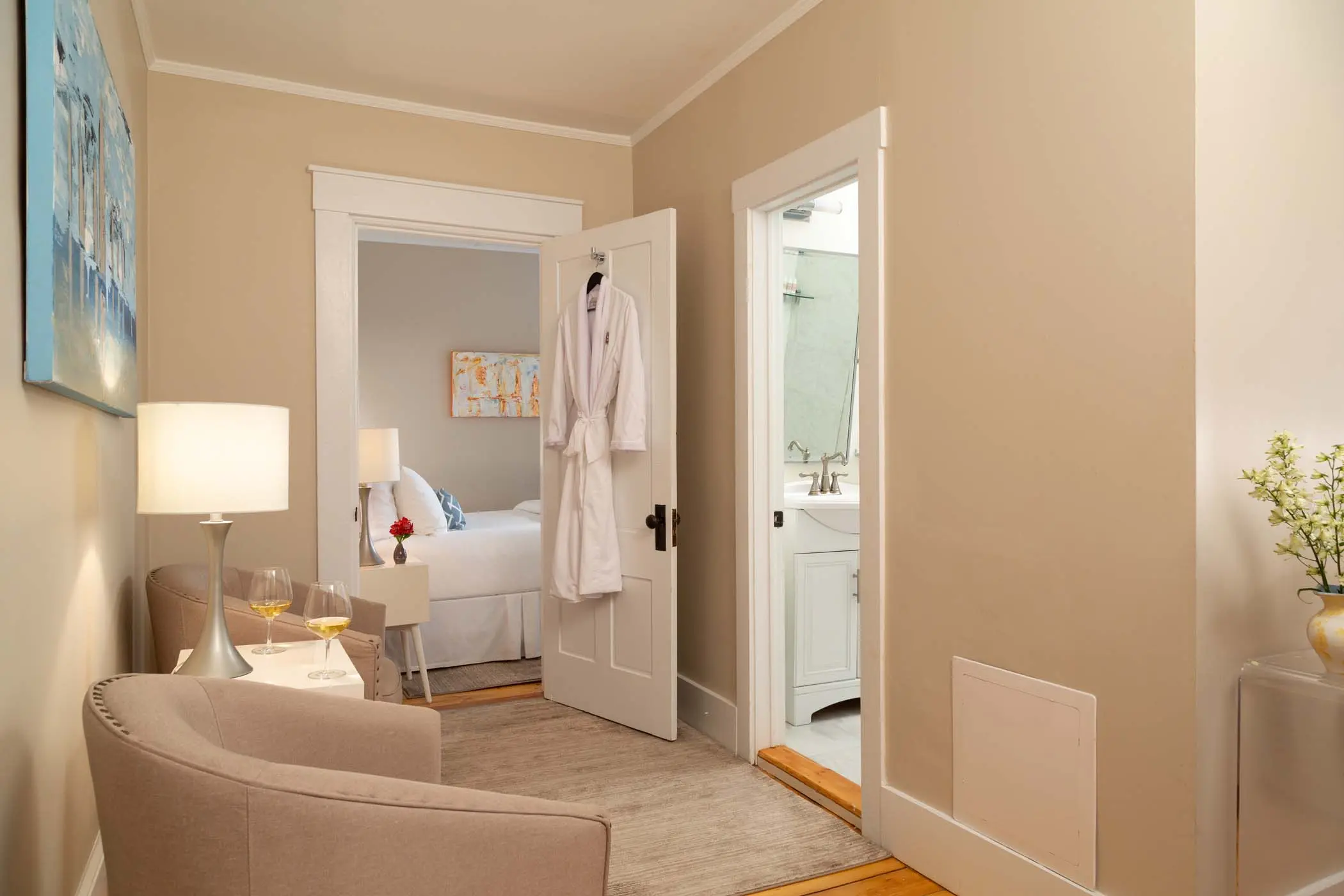 The hallway area leading to the bedroom, and bathroom of Room 15 at Chatham Inn