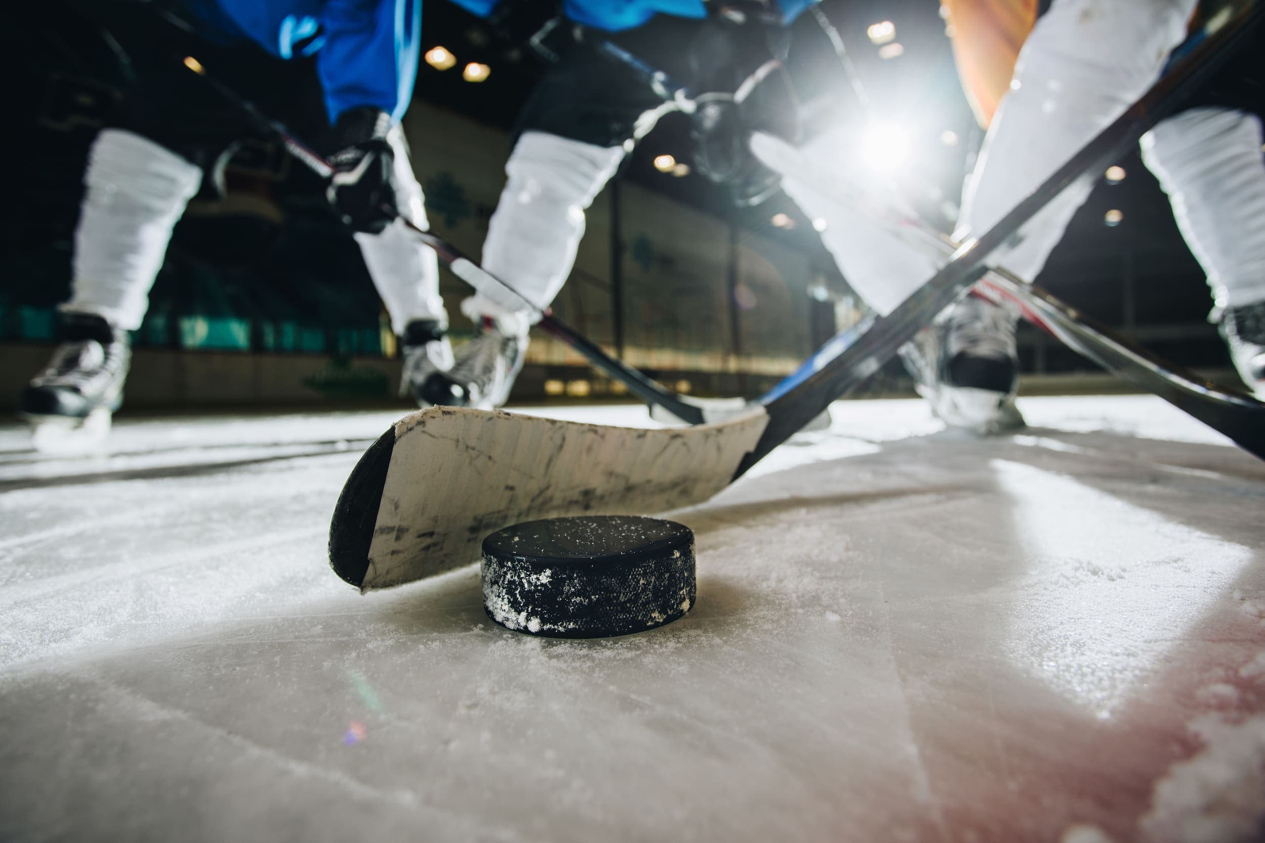 A close up of a hockey face off at OneHockey Tournament